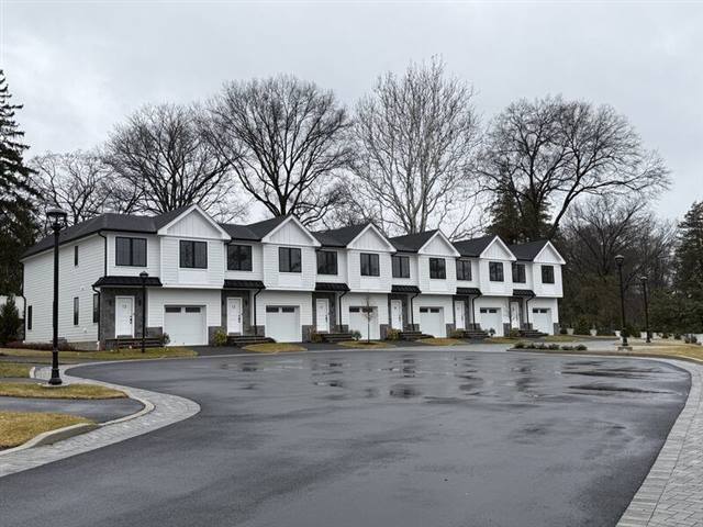 Multi-unit garage door installation in New Jersey by Binek Garage Doors
